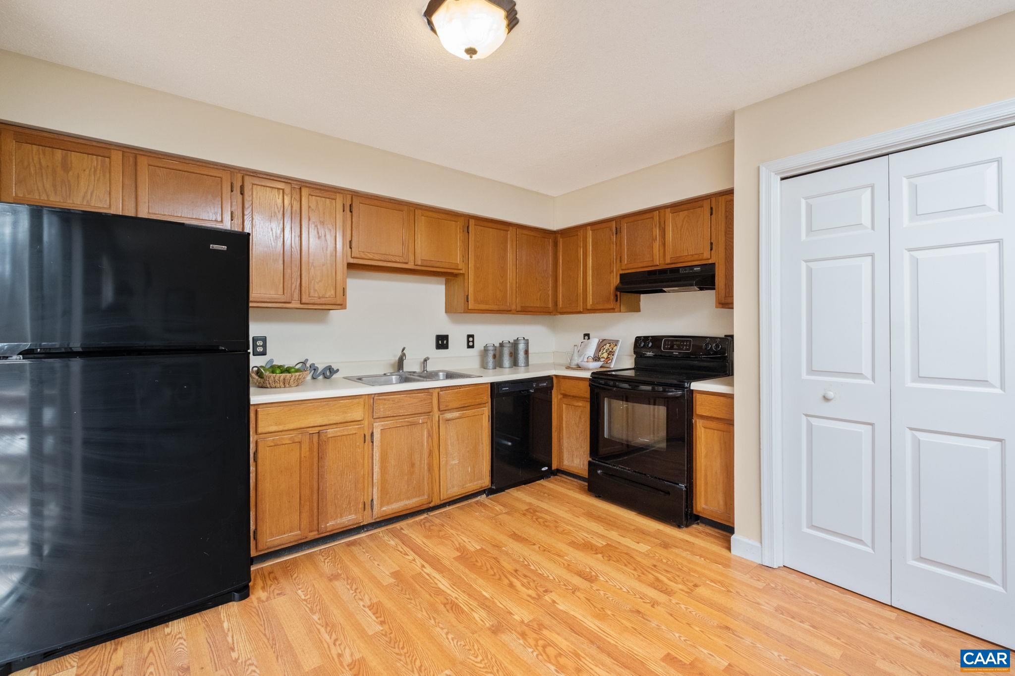 320 Westfield Road Charlottesville, VA 22901 - Photo 10 of 29 a kitchen with granite countertop a refrigerator stove top oven and sink
