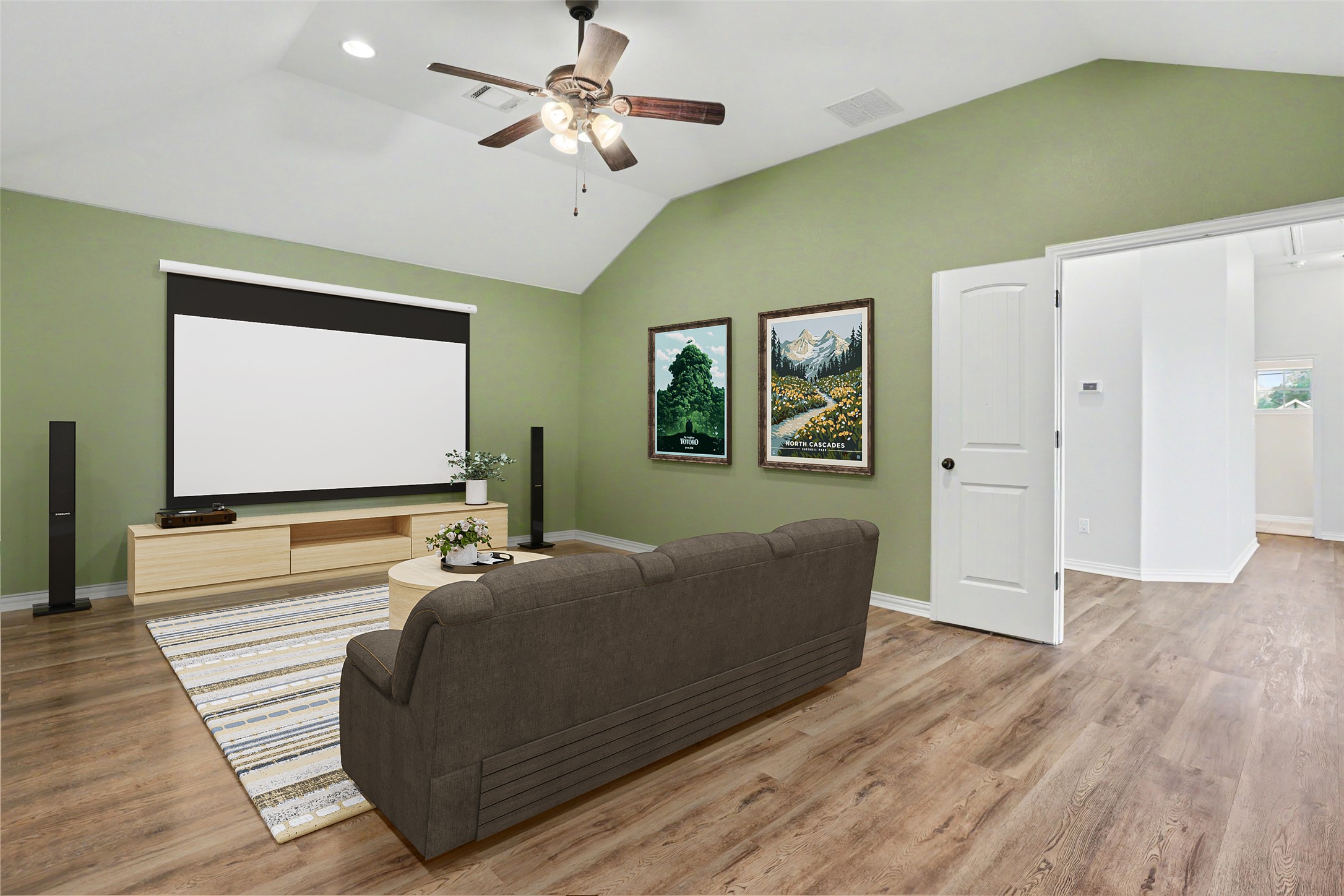 1020 Winding Way Drive Georgetown, TX 78628 - Photo 19 of 32 Living area featuring vaulted ceilings, a ceiling fan, and wood flooring