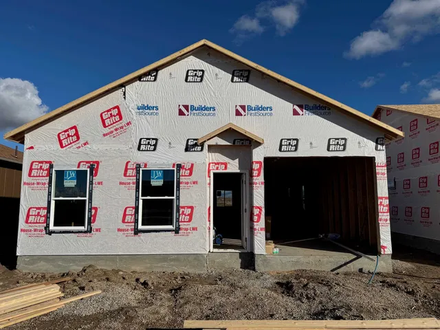 a front view of a building with retail shops