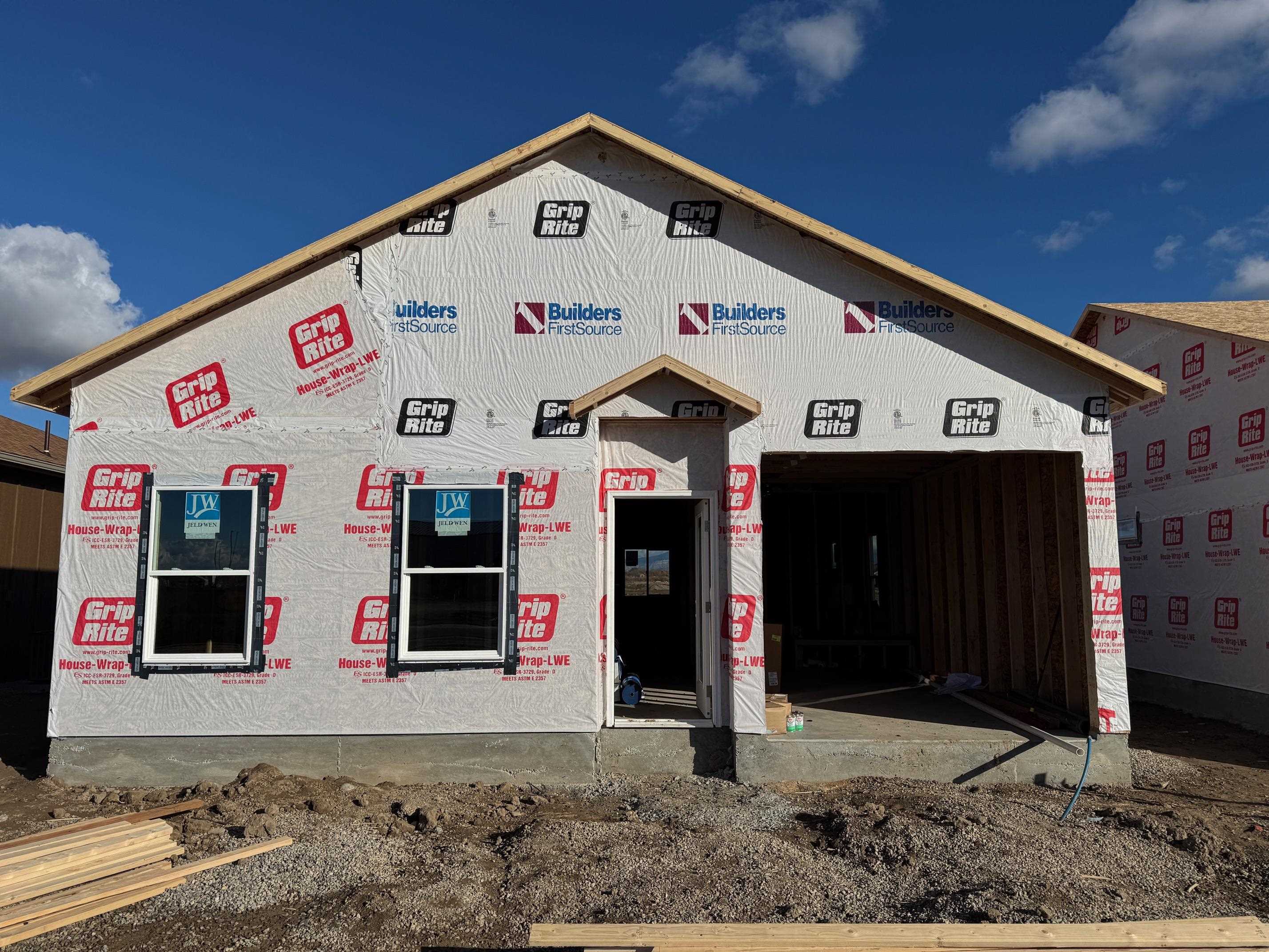 a front view of a building with retail shops