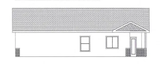 a black and white photo of a living room