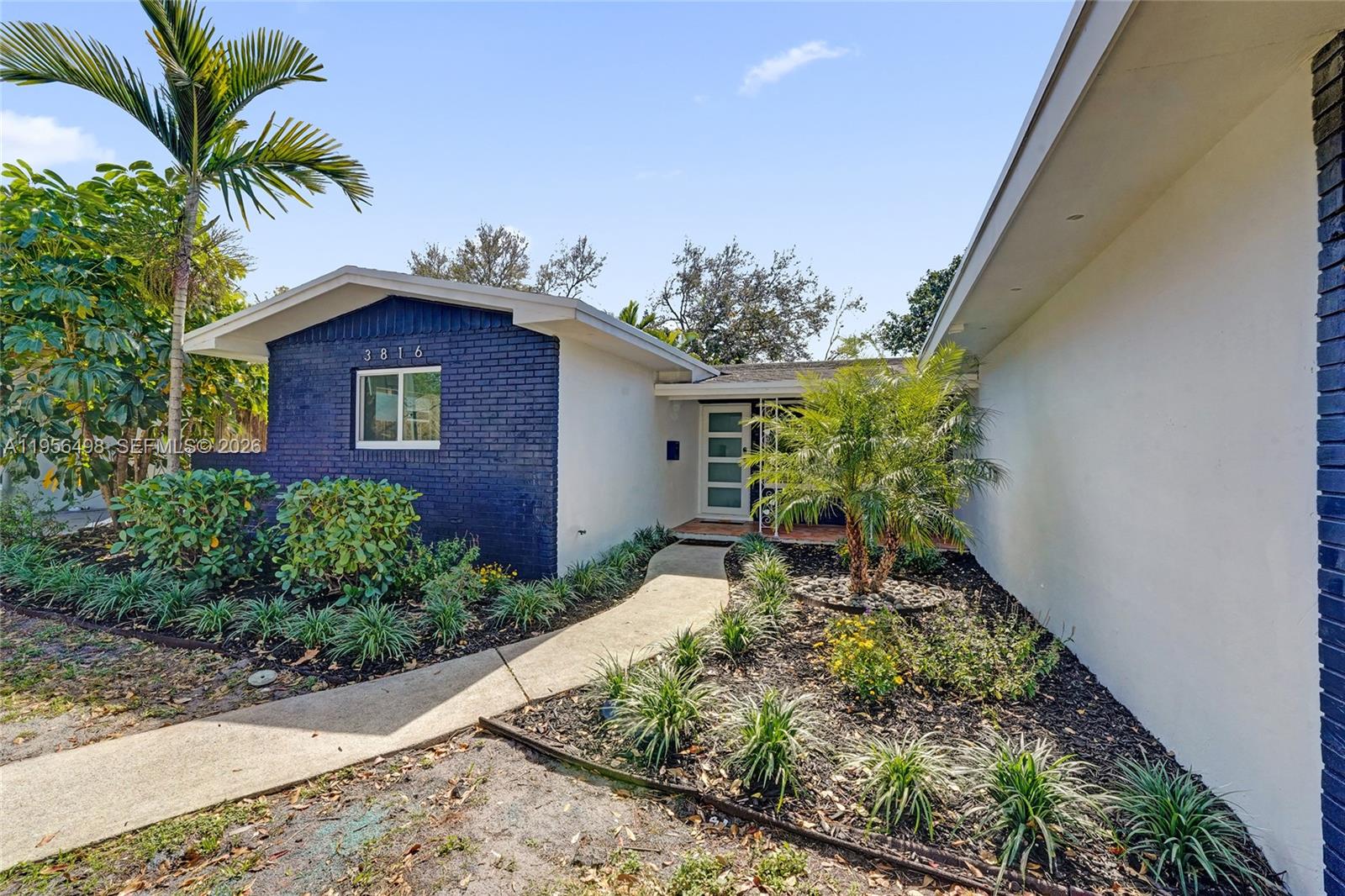 3816 West Park Road Hollywood, FL 33021 - Photo 3 of 55 NEWLY LANDSCAPED FRONT YARD