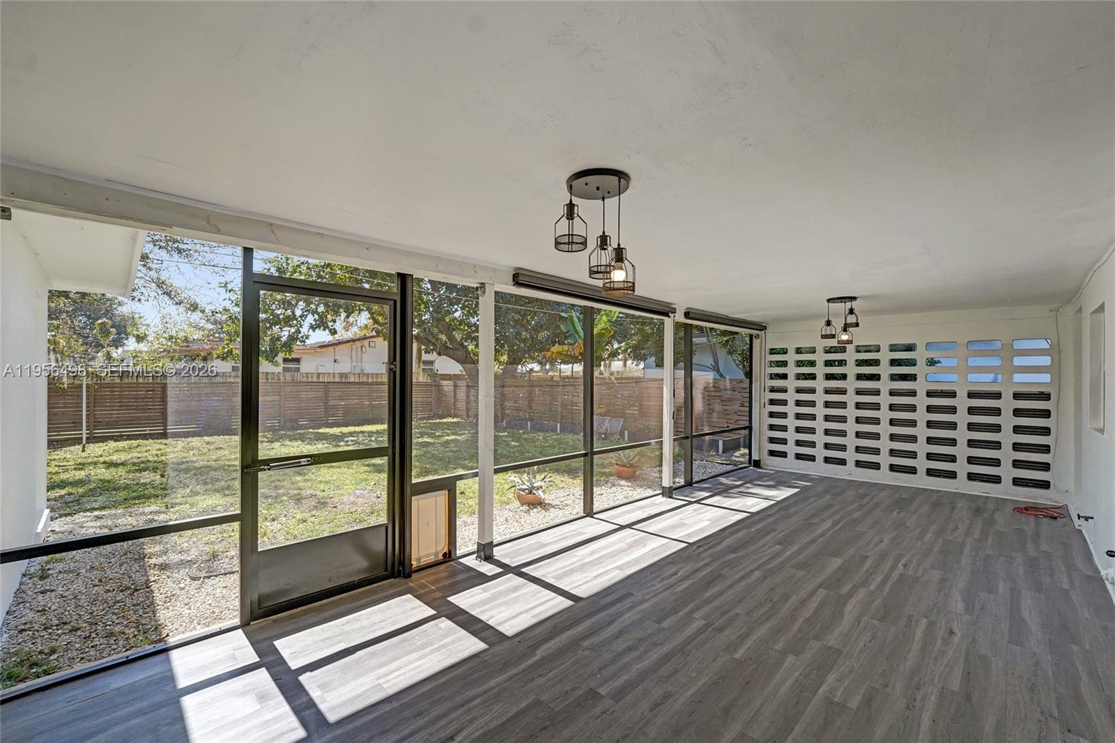 3816 West Park Road Hollywood, FL 33021 - Photo 35 of 55 EXTREMELY SPACIOUS SCREENED-IN PATIO