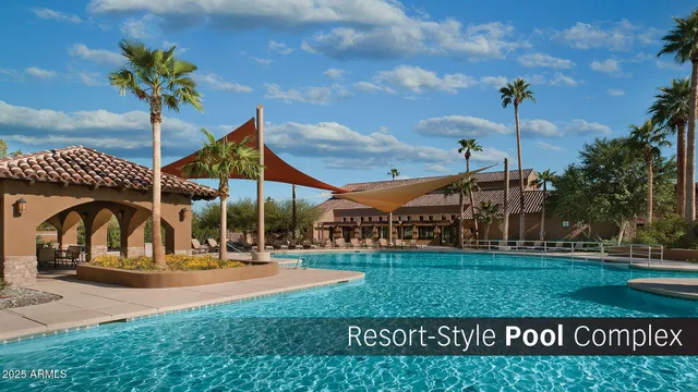 a room with gym equipment pool table and chairs