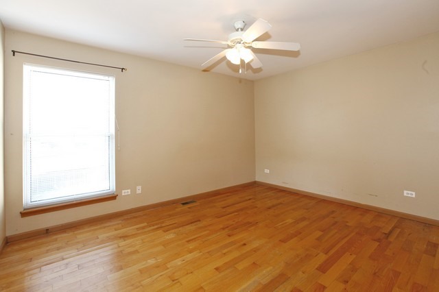 2213 Carpenter Avenue Plainfield, IL 60586 - Photo 15 of 25 an empty room with a window