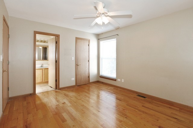 2213 Carpenter Avenue Plainfield, IL 60586 - Photo 16 of 25 a view of an empty room with a window