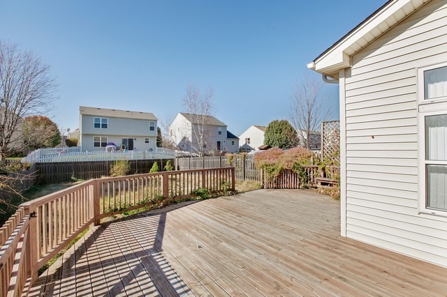 2213 Carpenter Avenue Plainfield, IL 60586 - Photo 19 of 25 a view of a balcony and yard