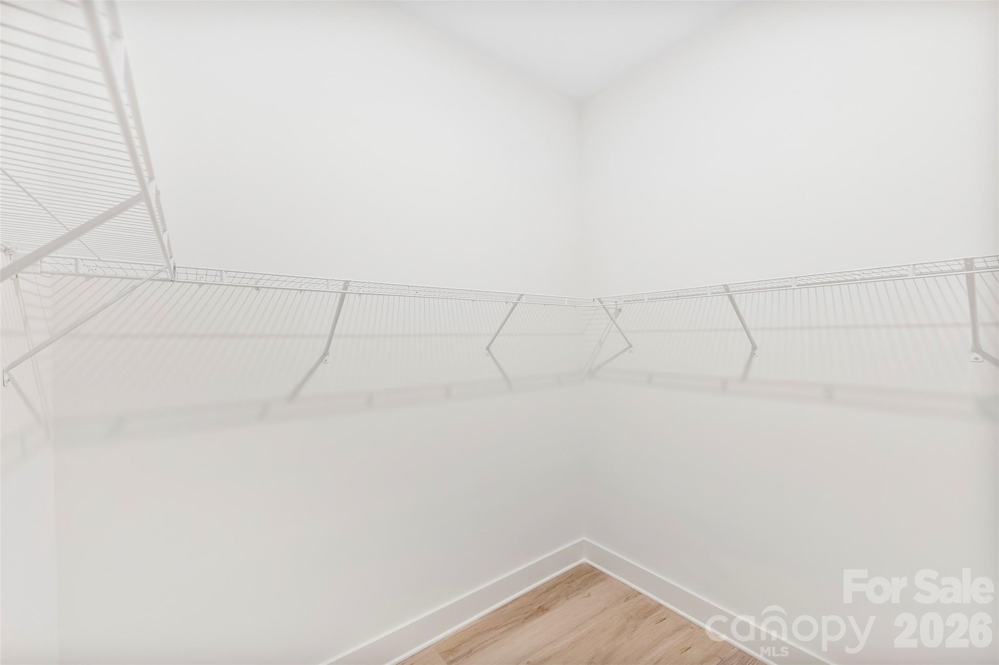 551 Perry Road Troutman, NC 28166 - Photo 23 of 47 a view of a room with racks on the wall