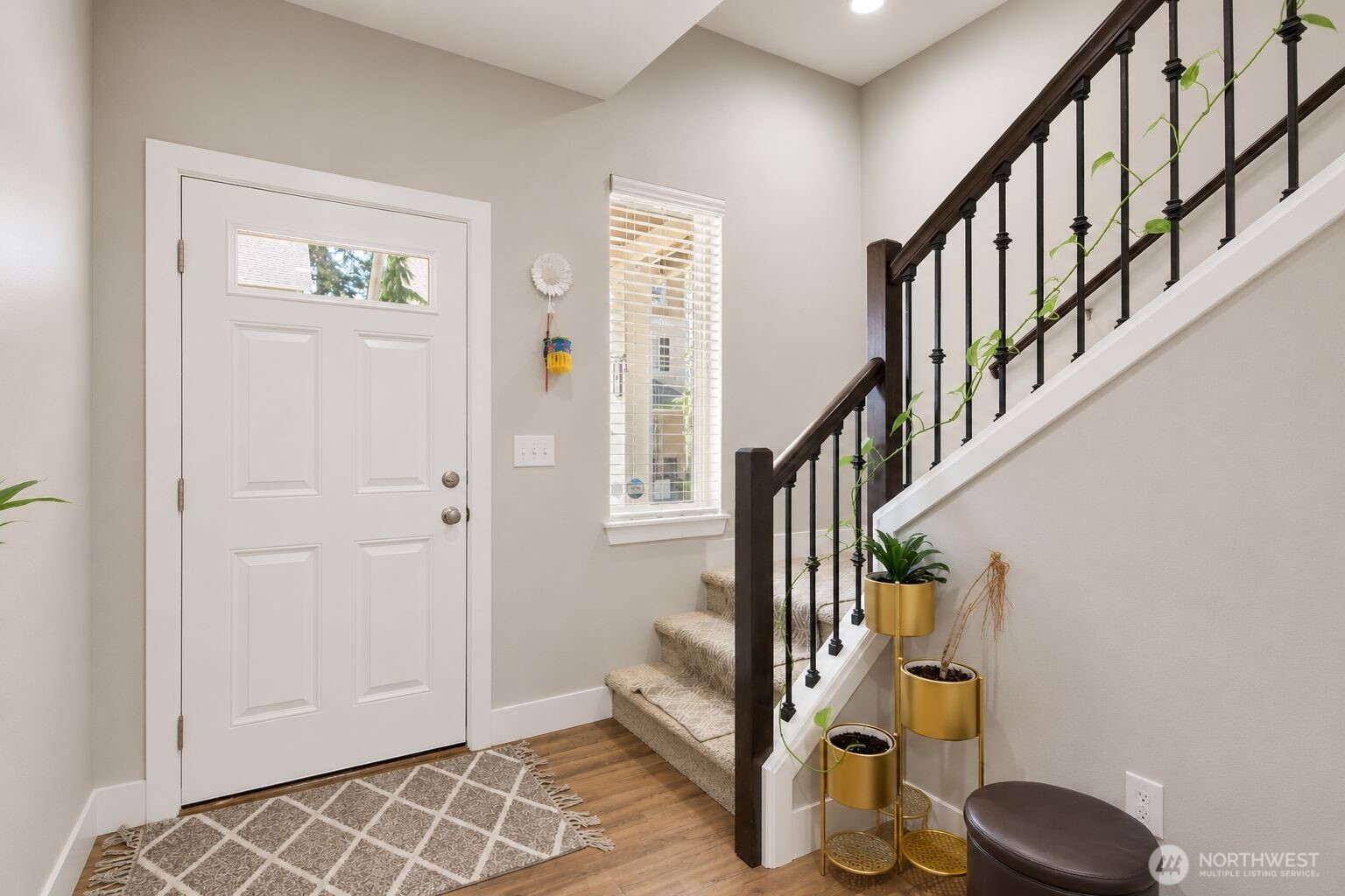 19607 25th Drive Southeast Bothell, WA 98012 - Photo 13 of 30 a view of an entryway with wooden floor and windows