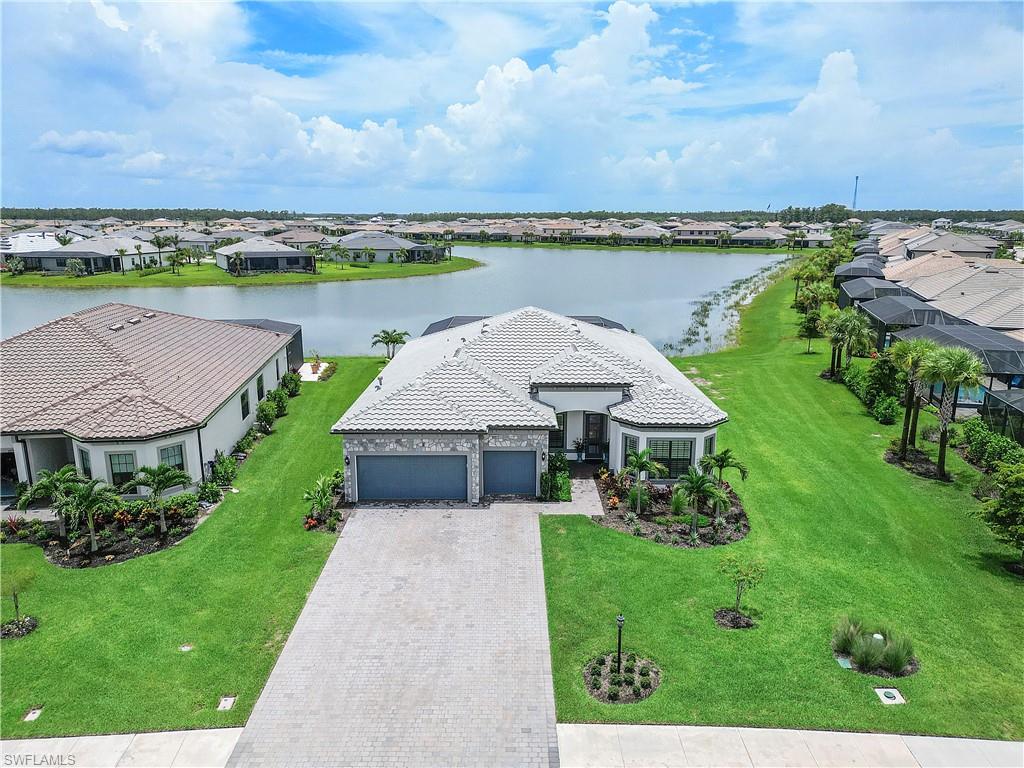 20150 Napa Loop Estero, FL 33928 - Photo 35 of 49 Birds eye view of property featuring a water view
