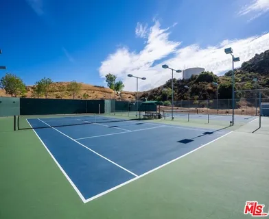 a view of a playground with houses