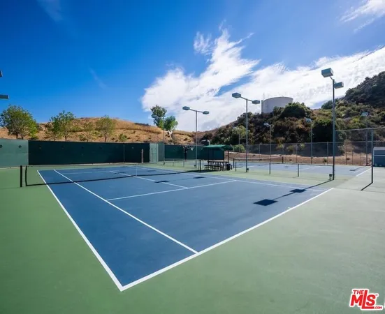 a view of a playground with houses
