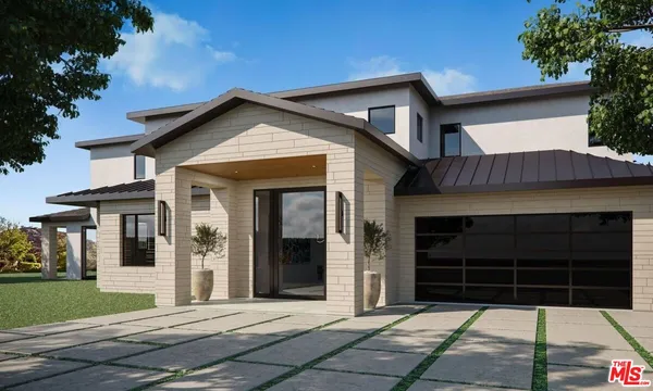 a view of a house with a door and a yard