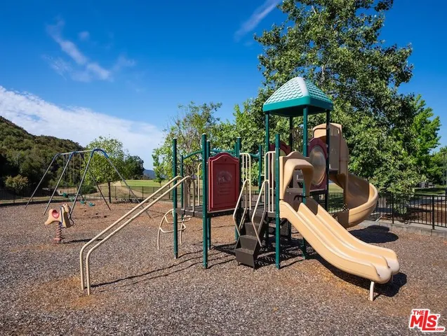 a view of a yard with plants