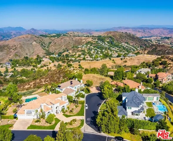 a view of a road with an ocean view