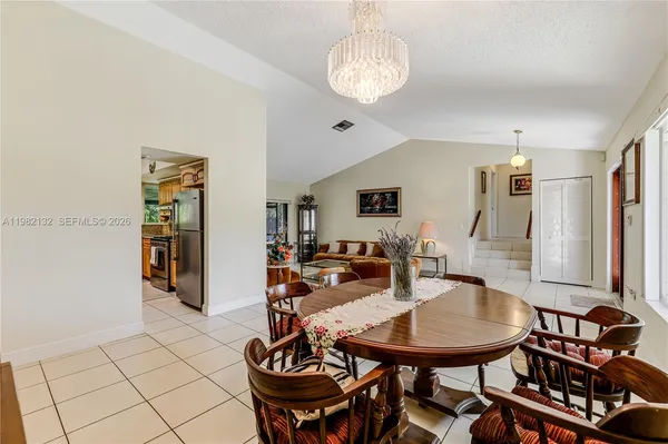 a view of a dining room with furniture