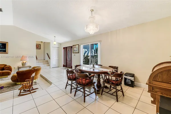 a view of a dining room with furniture