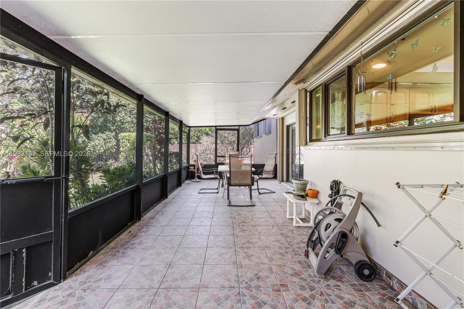 11541 Southwest 100th Street Miami, FL 33176 - Photo 30 of 51 a view of a chairs and table in a balcony
