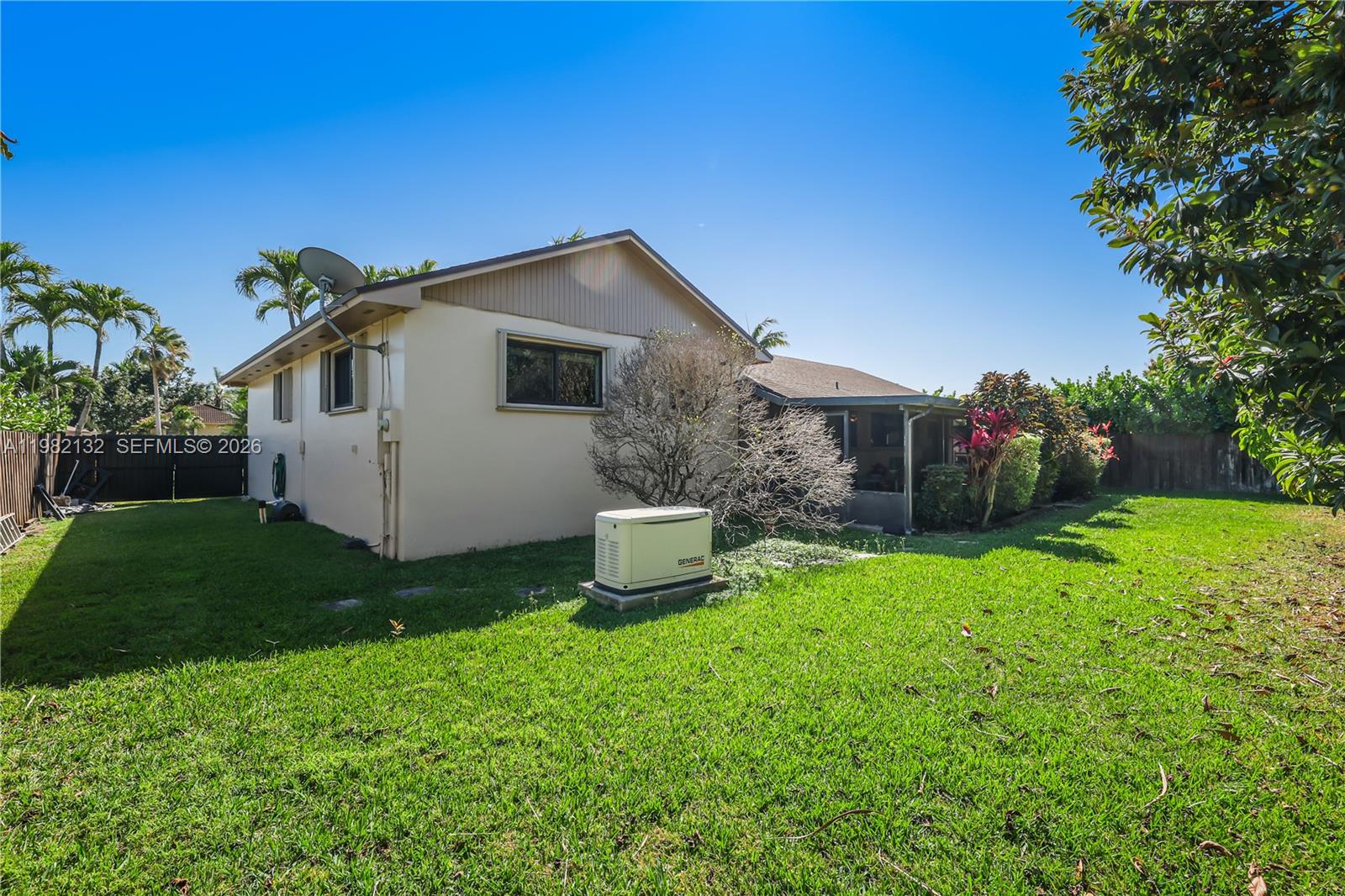 11541 Southwest 100th Street Miami, FL 33176 - Photo 34 of 51 a front view of a house with garden
