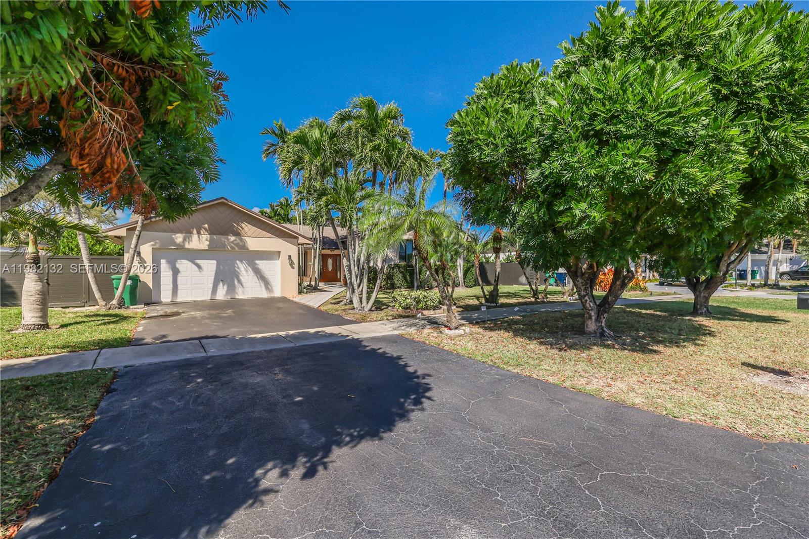 11541 Southwest 100th Street Miami, FL 33176 - Photo 4 of 51 a view of yard with tree in the background