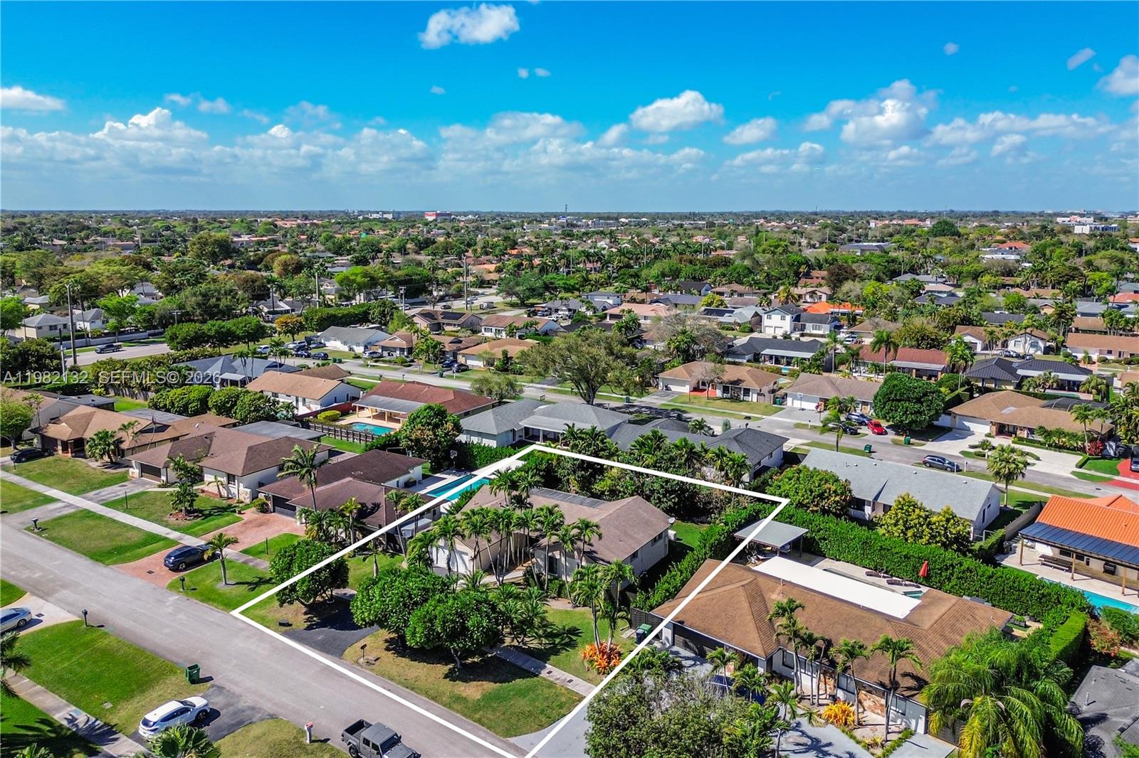 11541 Southwest 100th Street Miami, FL 33176 - Photo 46 of 51 an aerial view of a houses with a yard