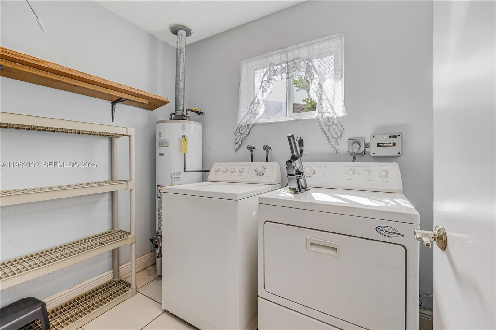 11541 Southwest 100th Street Miami, FL 33176 - Photo 5 of 51 a utility room with dryer and washer