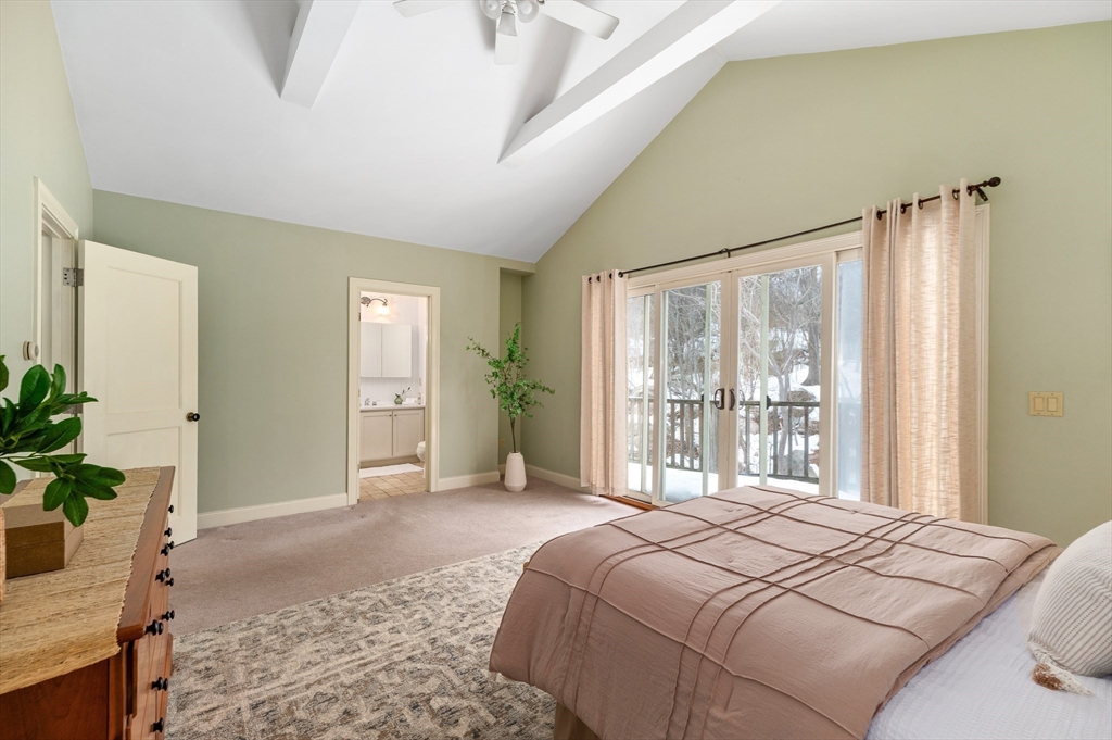 32 Witham Street, Unit B Gloucester, MA 01930 - Photo 16 of 36 a bedroom with a bed and a potted plant