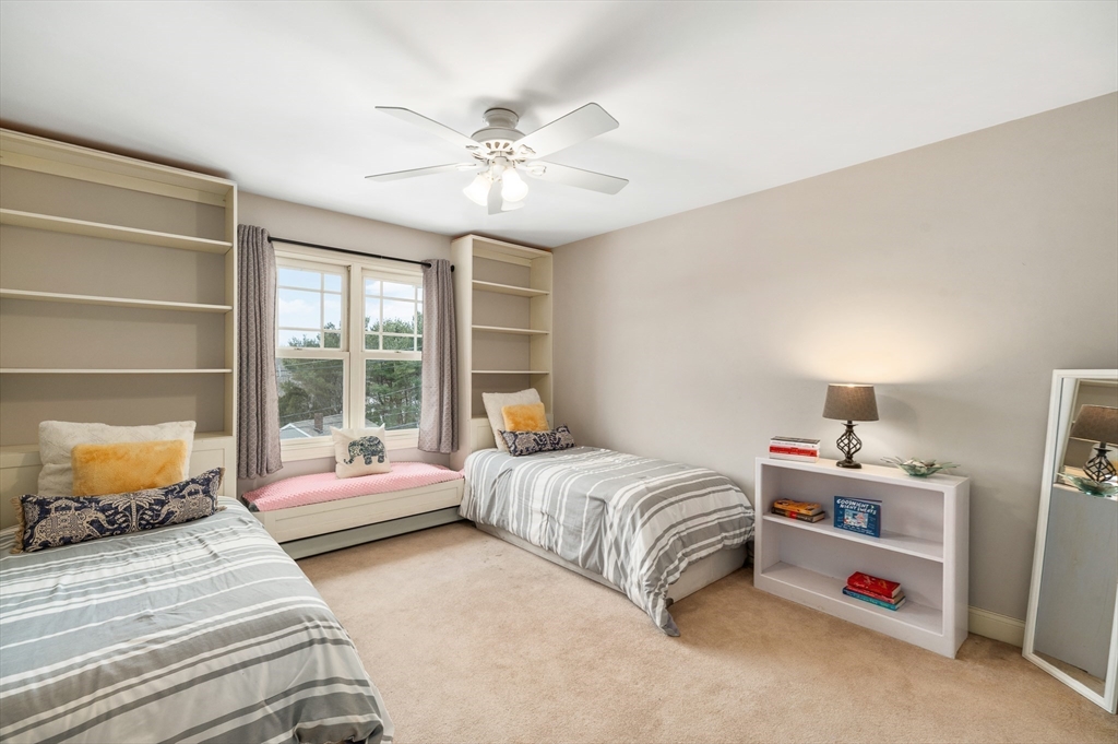 32 Witham Street, Unit B Gloucester, MA 01930 - Photo 19 of 36 a bedroom with a bed and a window