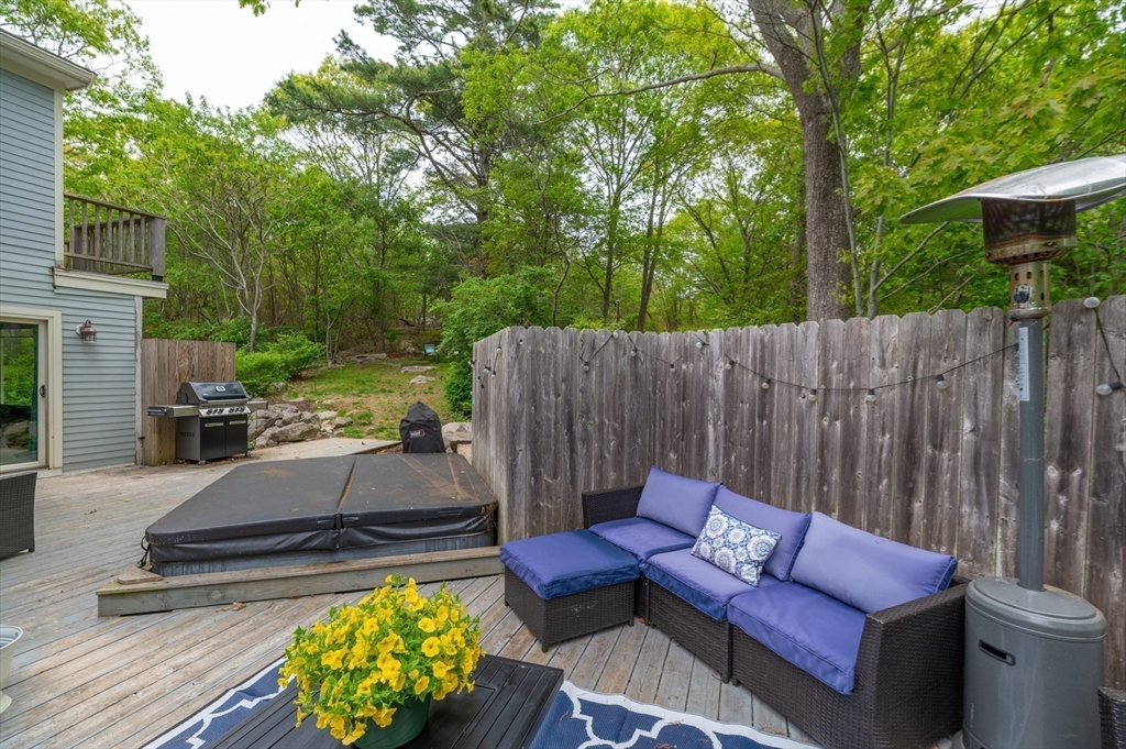 32 Witham Street, Unit B Gloucester, MA 01930 - Photo 31 of 36 a view of backyard with outdoor seating