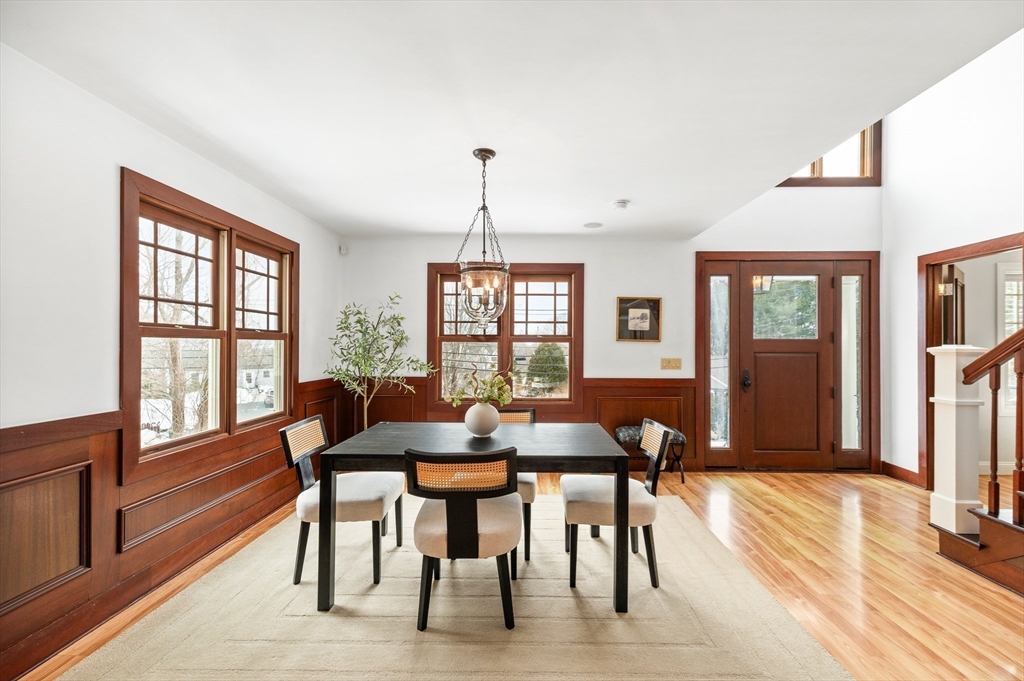 32 Witham Street, Unit B Gloucester, MA 01930 - Photo 9 of 36 a view of a dining room with furniture window and wooden floor