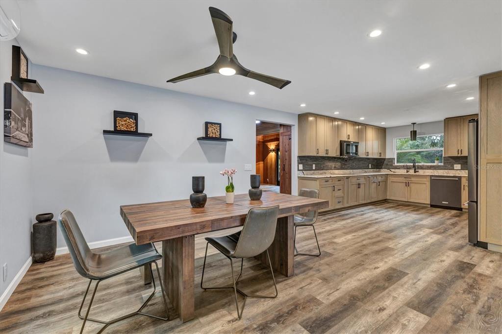 2308 Shadow Oaks Road Sarasota, FL 34240 - Photo 15 of 84 a view of a dining room with furniture