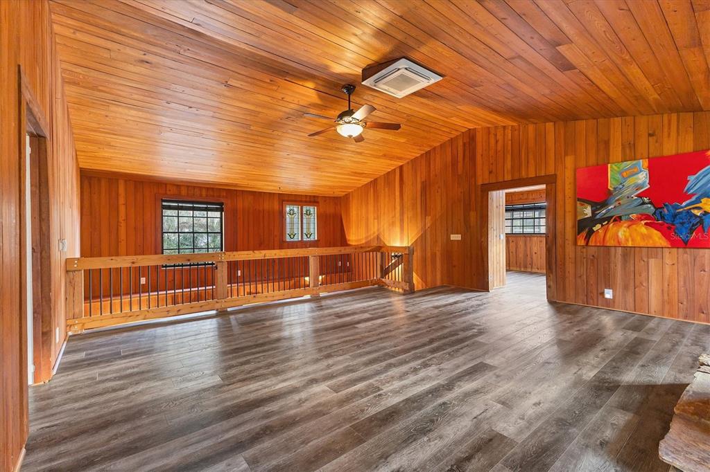 2308 Shadow Oaks Road Sarasota, FL 34240 - Photo 24 of 84 a view of empty room with wooden floor
