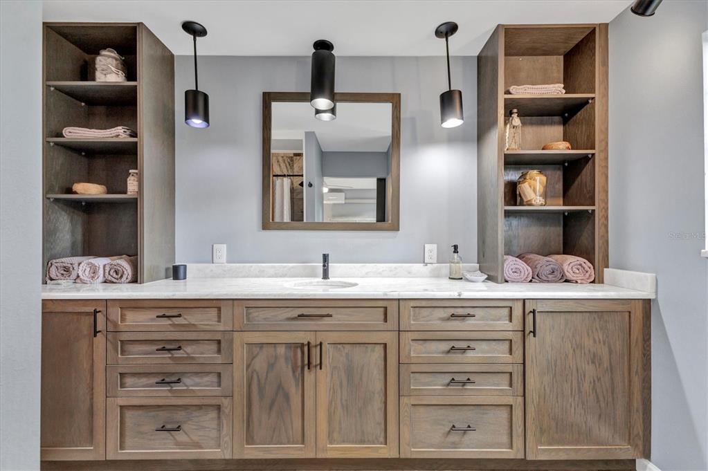 2308 Shadow Oaks Road Sarasota, FL 34240 - Photo 29 of 84 a bathroom with a double vanity sink and