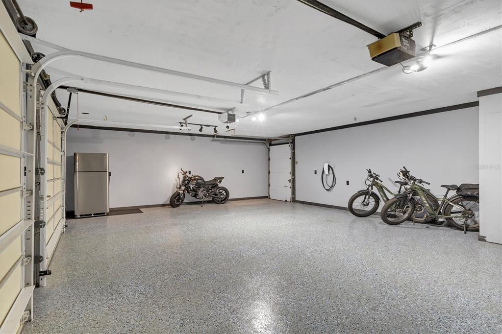 2308 Shadow Oaks Road Sarasota, FL 34240 - Photo 48 of 84 a view of a garage with rack and bicycle
