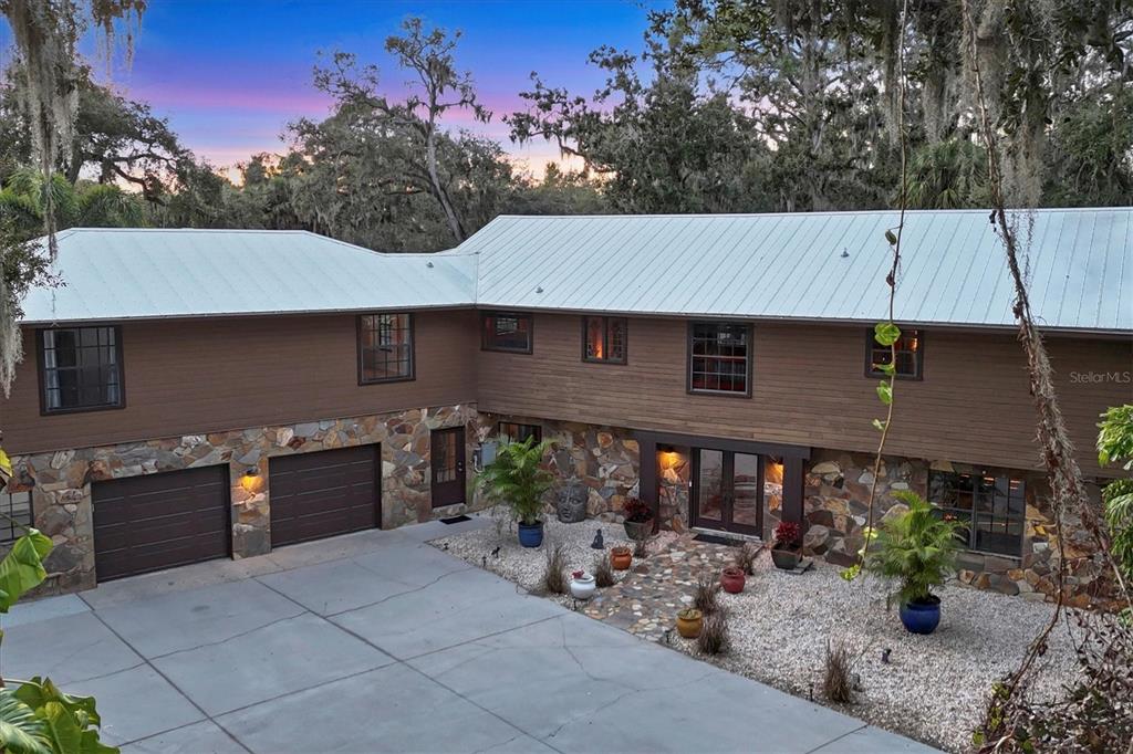 2308 Shadow Oaks Road Sarasota, FL 34240 - Photo 66 of 84 a aerial view of a house with a yard and sitting area
