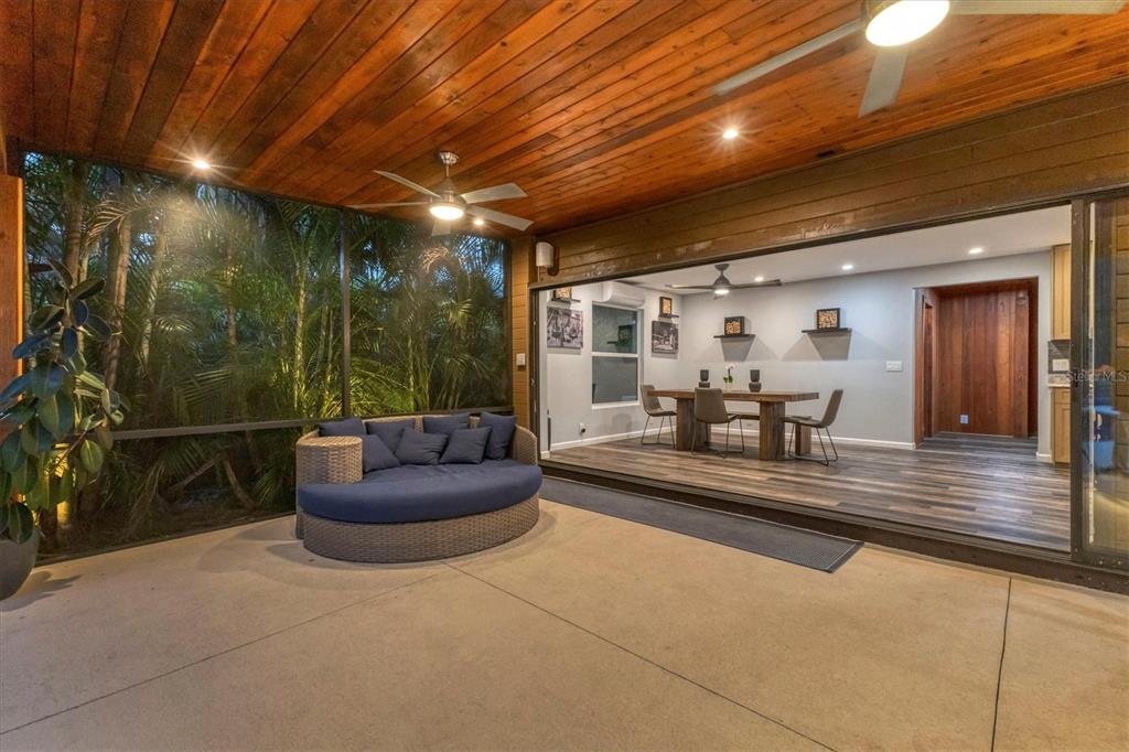 2308 Shadow Oaks Road Sarasota, FL 34240 - Photo 76 of 84 a living room with furniture and a potted plant