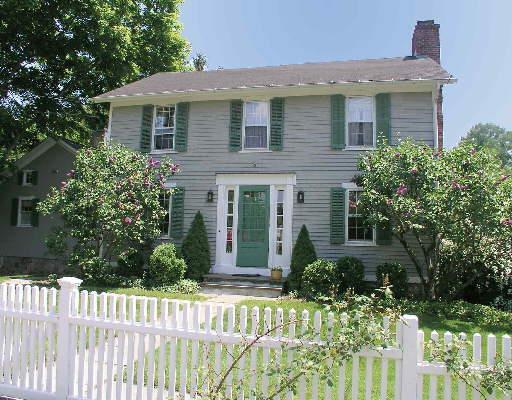308 Greens Farms Road Westport, CT 06880 - Photo 1 of 1 a front view of a house with a porch