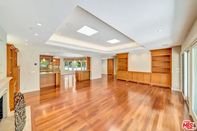 a kitchen with stainless steel appliances granite countertop a stove and a sink
