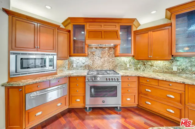 a view of a storage & utility room with closet window