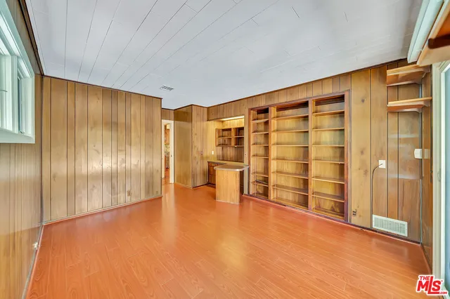 a bathroom with a double vanity sink mirror and bathtub