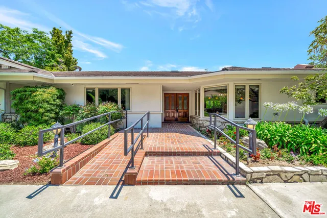 a view of a house with a patio