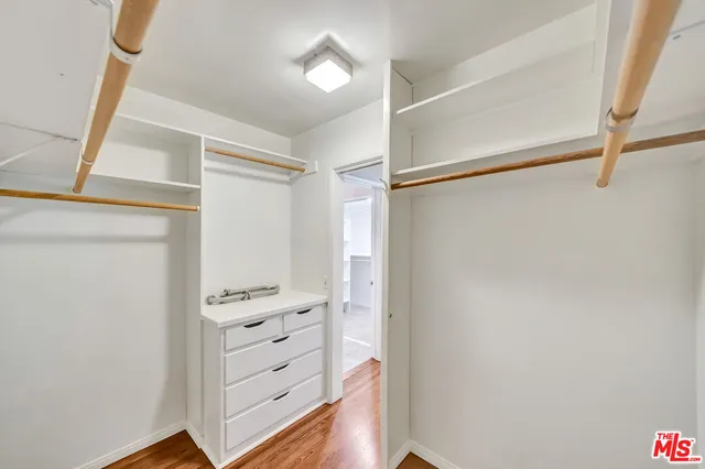 a kitchen that has a sink and cabinets
