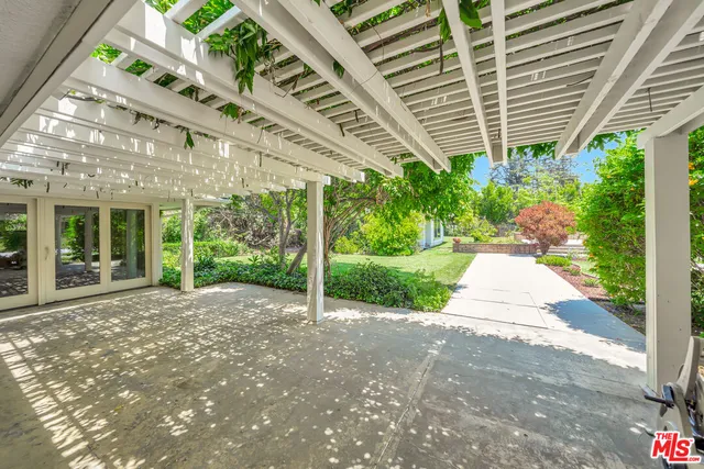 an aerial view of house with a swimming pool