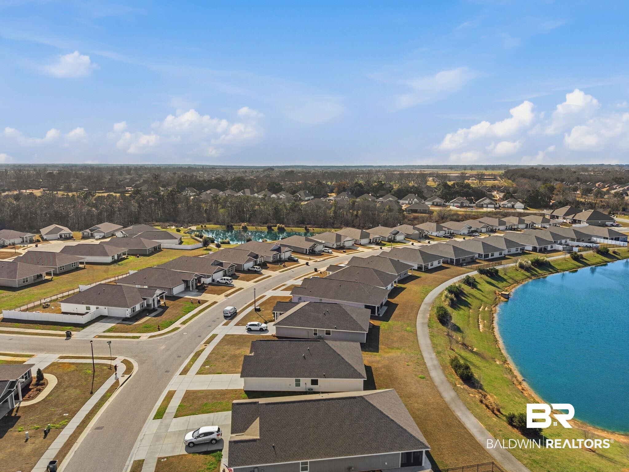 23952 Citation Loop Daphne, AL 36526 - Photo 68 of 69 Aerial perspective of suburban area featuring a large body of water