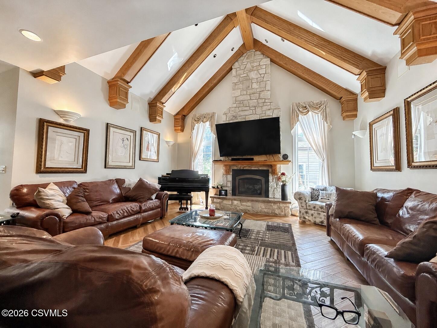 50 Sweet Gum Road Selinsgrove, PA 17870 - Photo 37 of 82 a living room with furniture a flat screen tv and a fireplace