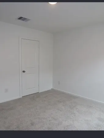 a view of a kitchen with a sink