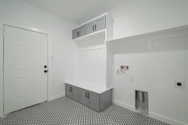 a bathroom with a bathtub and shower