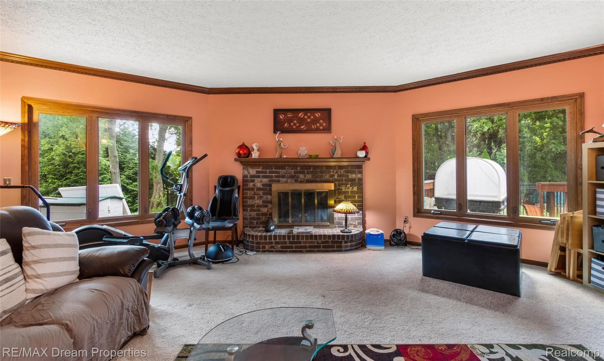 3110 Burlington Drive Rochester, MI 48306 - Photo 13 of 34 OVERSIZED FAMILY ROOM WITH RAISED HEARTH GAS FIREPLACE