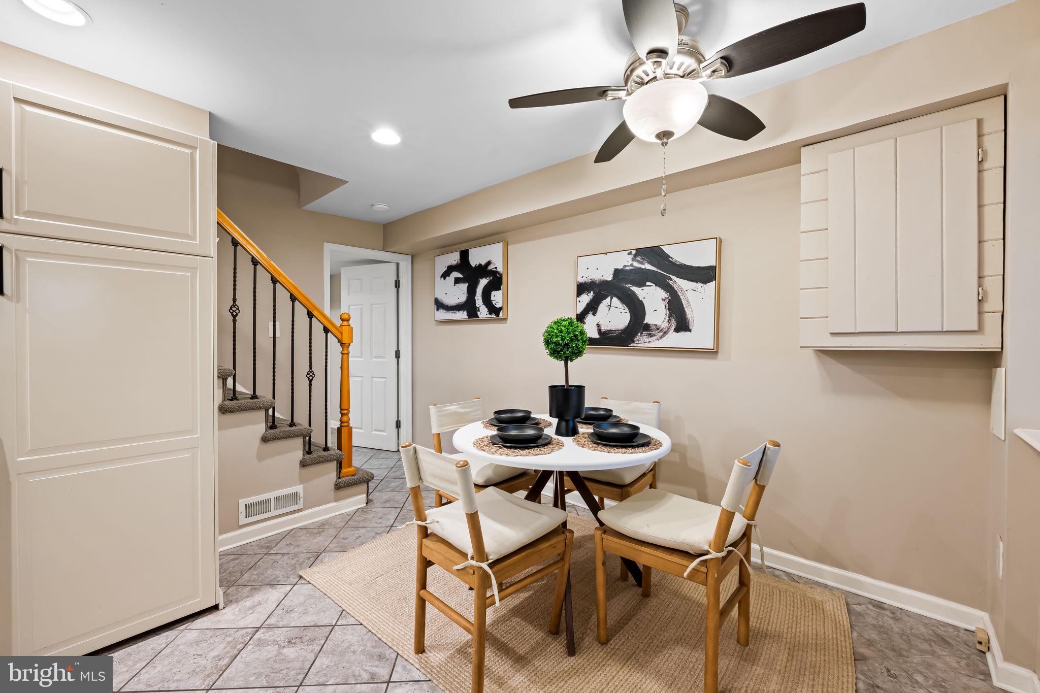 1817 Dunmere Road Baltimore, MD 21222 - Photo 8 of 27 a dining room with furniture and window