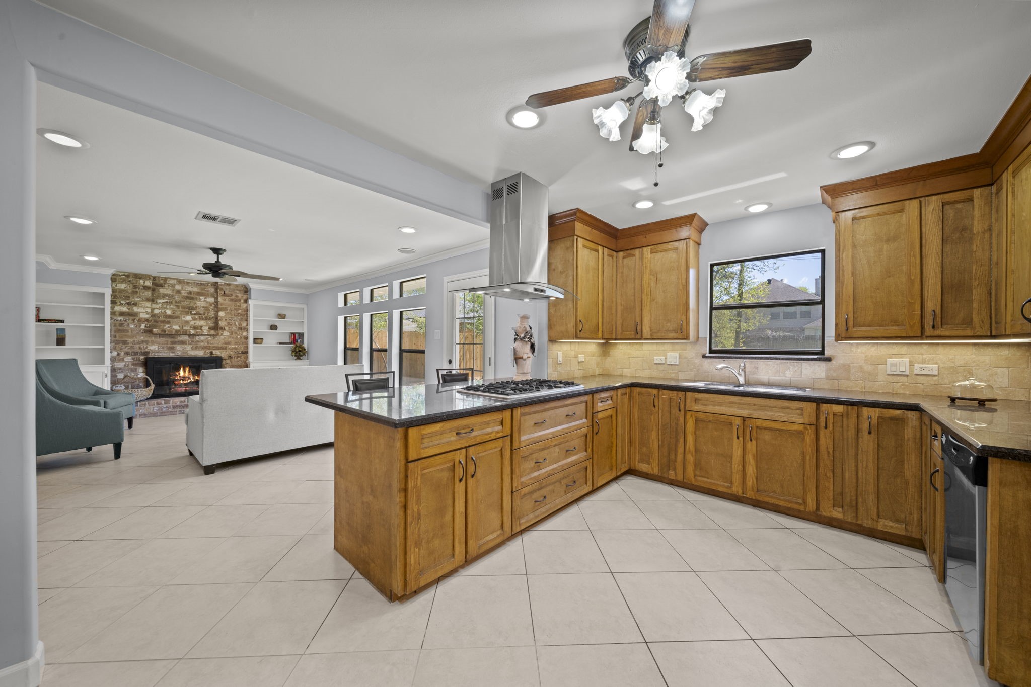 6315 Allentown Drive Spring, TX 77389 - Photo 19 of 46 a kitchen with a sink a counter space cabinets and appliances